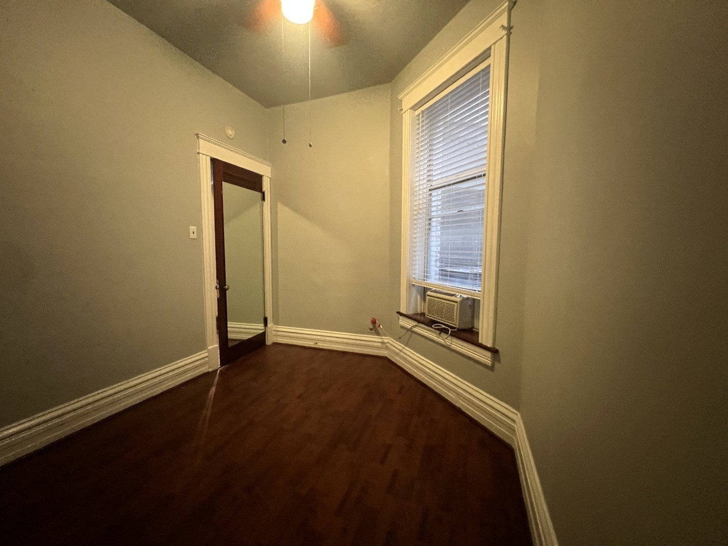 3545 North Sheffield Avenue, Unit 1 Chicago, IL 60657 - Photo 18 of 23 a view of an empty room with a window