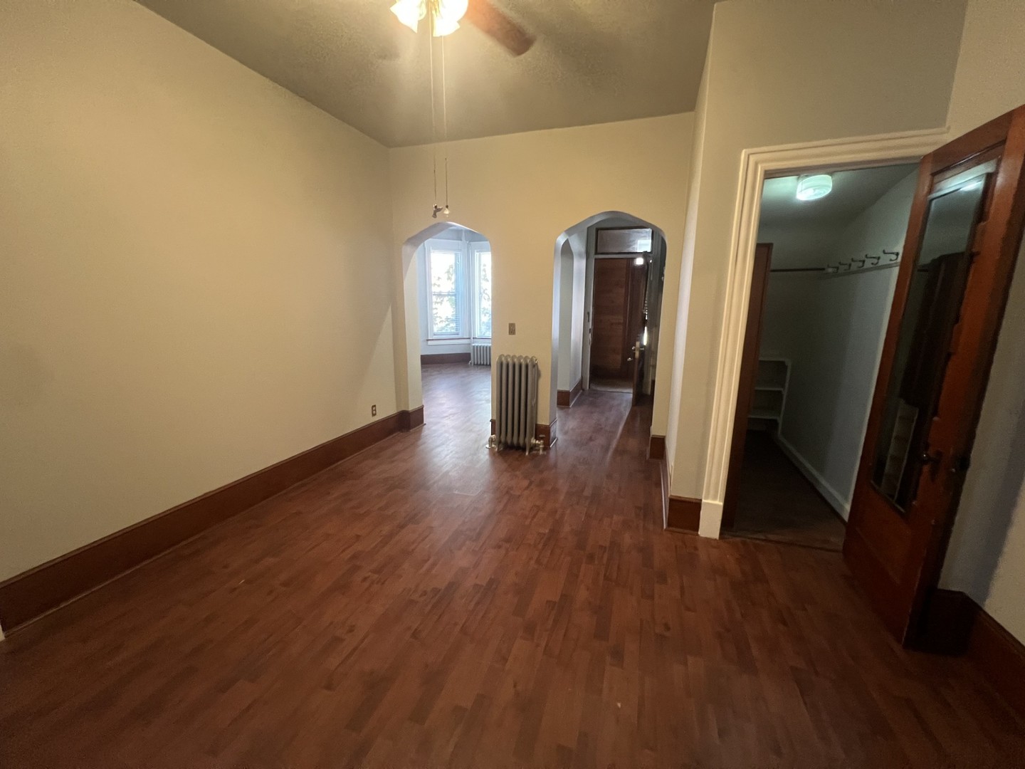 3545 North Sheffield Avenue, Unit 1 Chicago, IL 60657 - Photo 6 of 23 wooden floor in an empty room