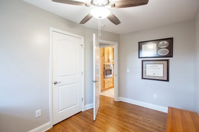 a bathroom with a toilet a bath tub and a shower