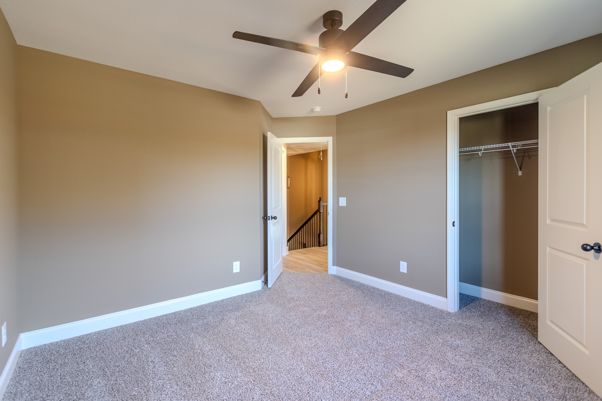 22 Garrettsburg Road Clarksville, TN 37042 - Photo 15 of 21 an empty room with closet and a ceiling fan