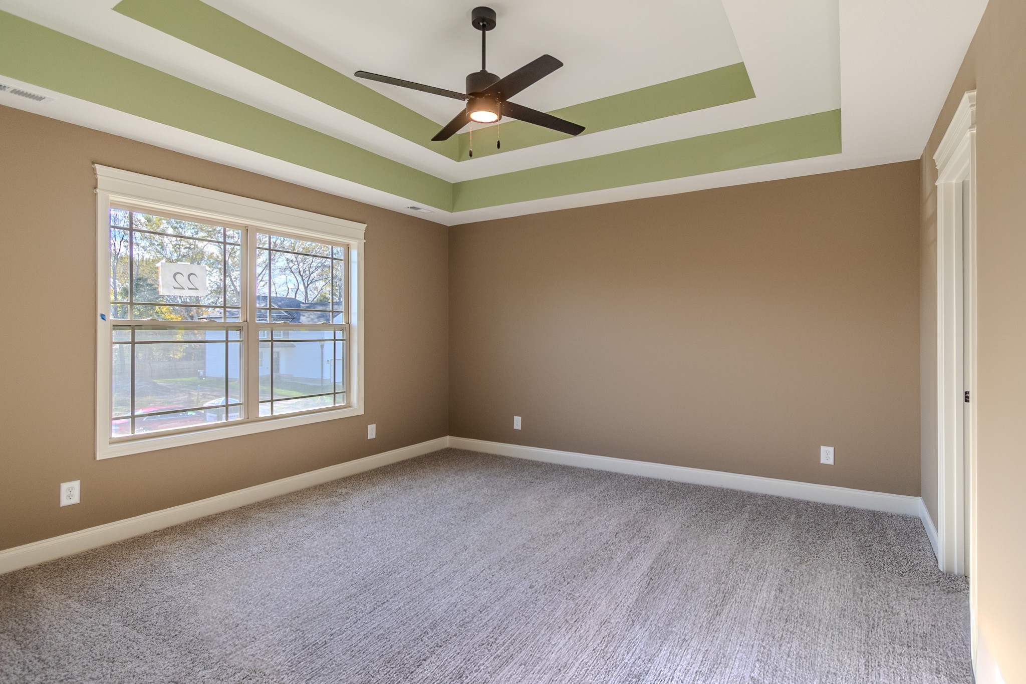 22 Garrettsburg Road Clarksville, TN 37042 - Photo 10 of 21 a view of an empty room with window and chandelier fan