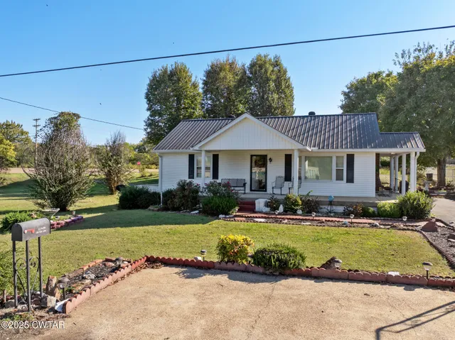 a view of a house with a swimming pool