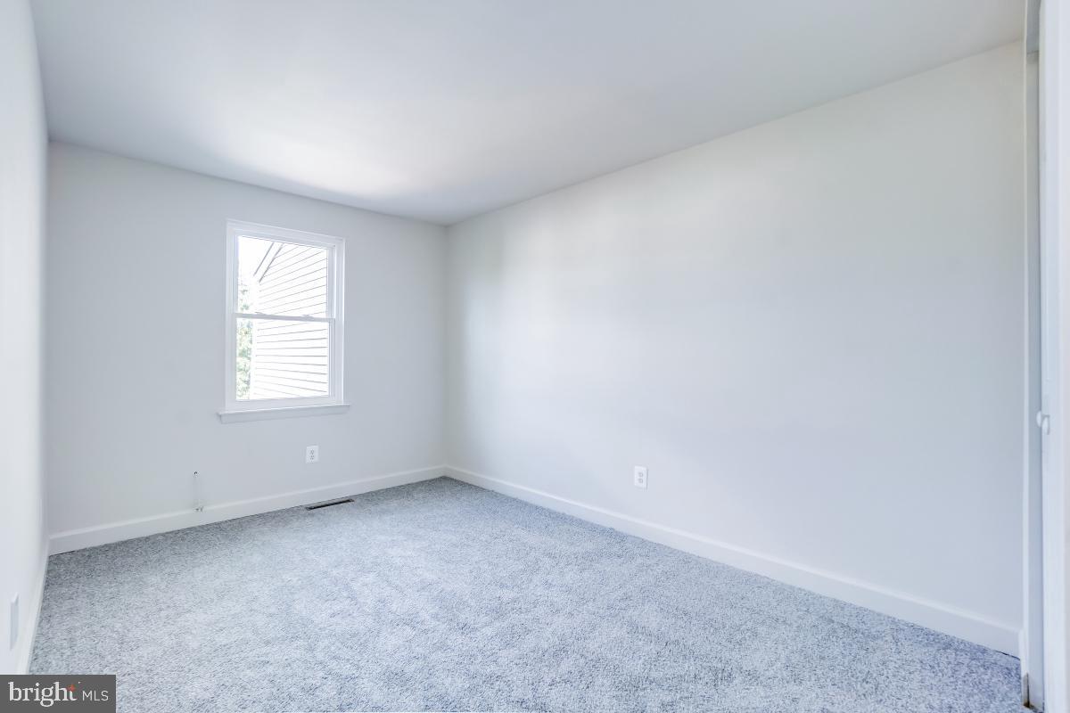 1111 Providence Court Frederick, MD 21703 - Photo 21 of 30 an empty room with a window