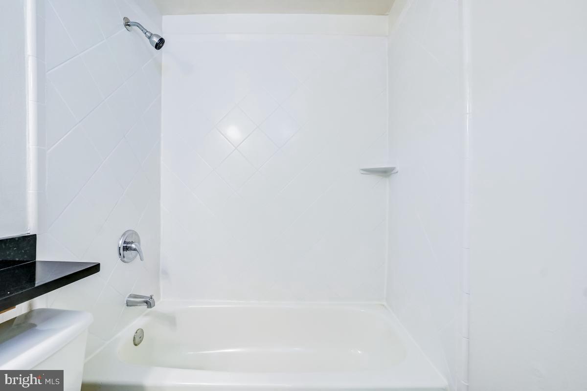 1111 Providence Court Frederick, MD 21703 - Photo 26 of 30 a bathroom with a bathtub