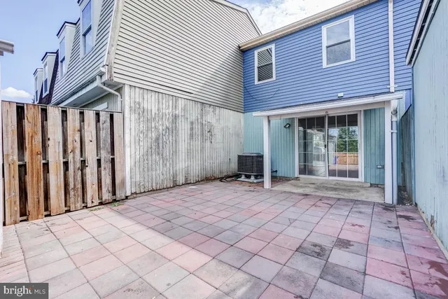 a front view of a house with white door