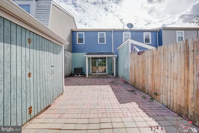 a view of a backyard of the house