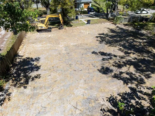 a view of a backyard of the house