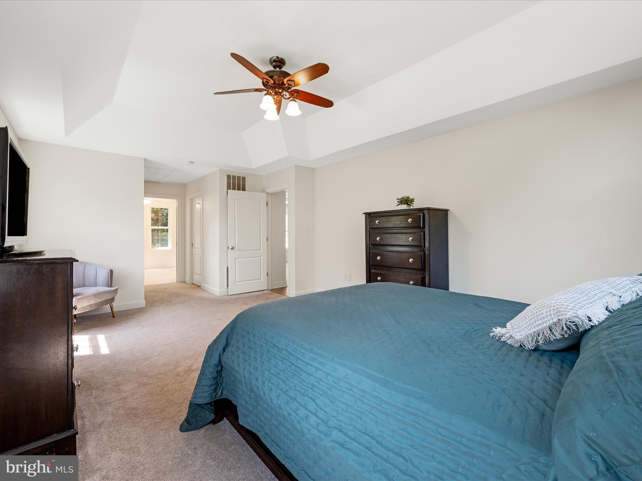 2358 Cave Ridge Road Mount Jackson, VA 22842 - Photo 19 of 59 a bedroom with a bed and wooden floor