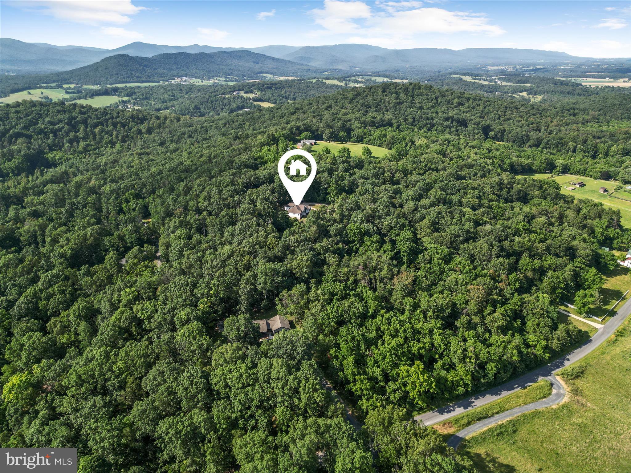 2358 Cave Ridge Road Mount Jackson, VA 22842 - Photo 56 of 59 a view of a city with lush green forest