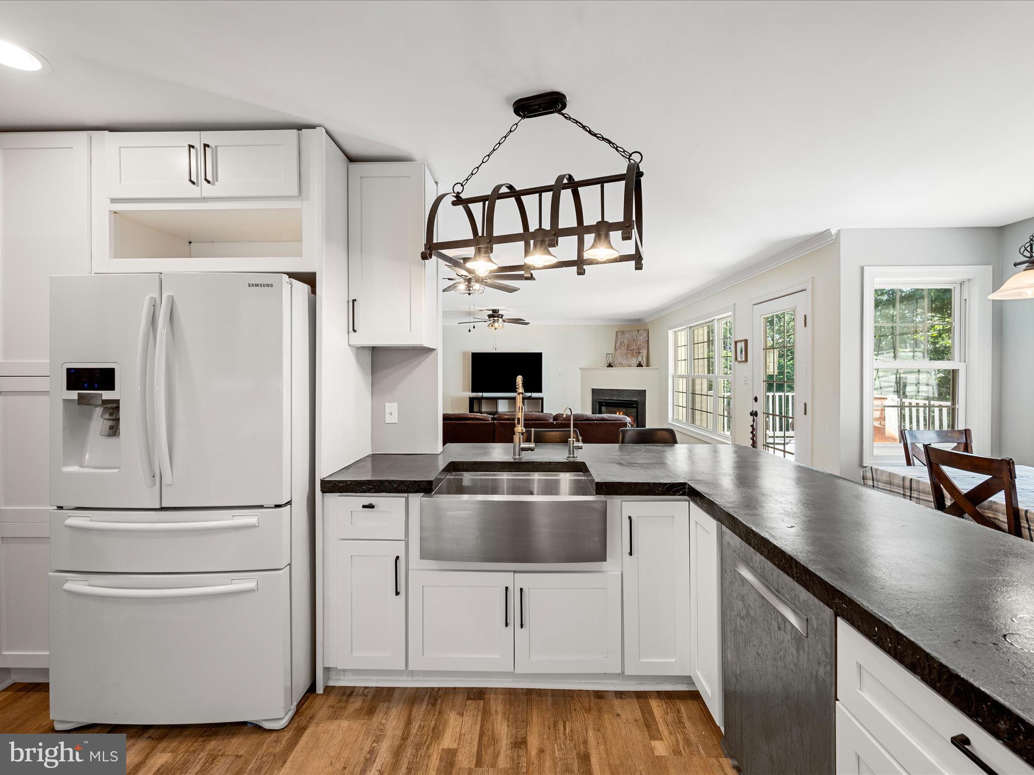2358 Cave Ridge Road Mount Jackson, VA 22842 - Photo 6 of 59 a kitchen with kitchen island a white counter top space stainless steel appliances and cabinets