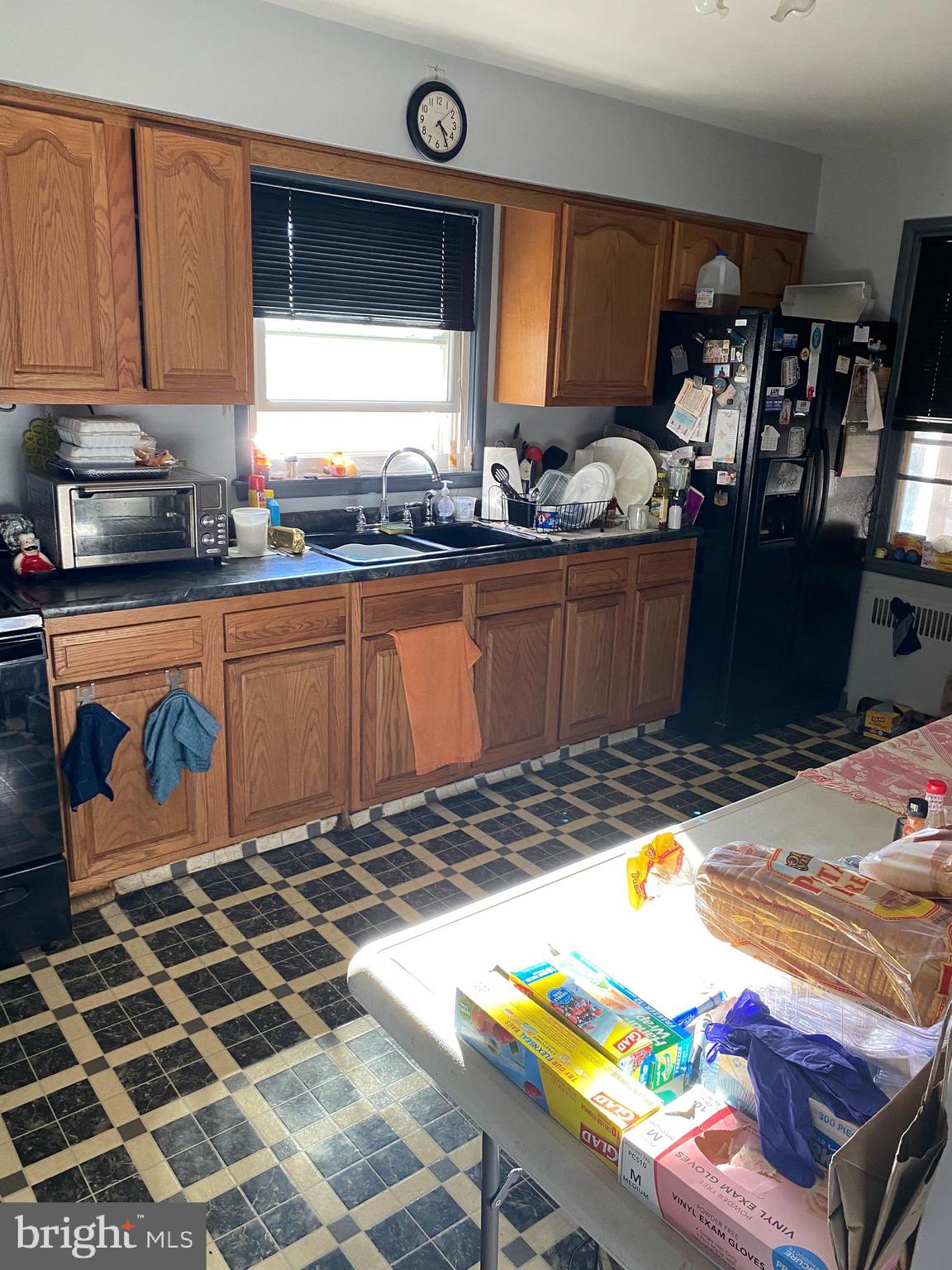 8305 Windsor Mill Road Baltimore, MD 21244 - Photo 5 of 15 a room with storage and utility