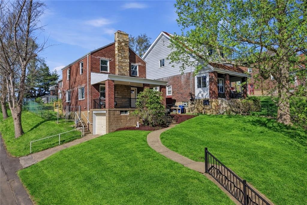 6501 Landview Road Pittsburgh, PA 15217 - Photo 1 of 41 a front view of house with yard and green space