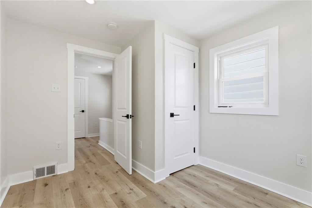 6501 Landview Road Pittsburgh, PA 15217 - Photo 28 of 41 a view of a room with wooden floor and a bathroom