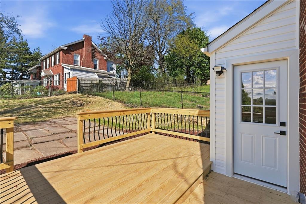 6501 Landview Road Pittsburgh, PA 15217 - Photo 33 of 41 a view of a brick house with a small yard