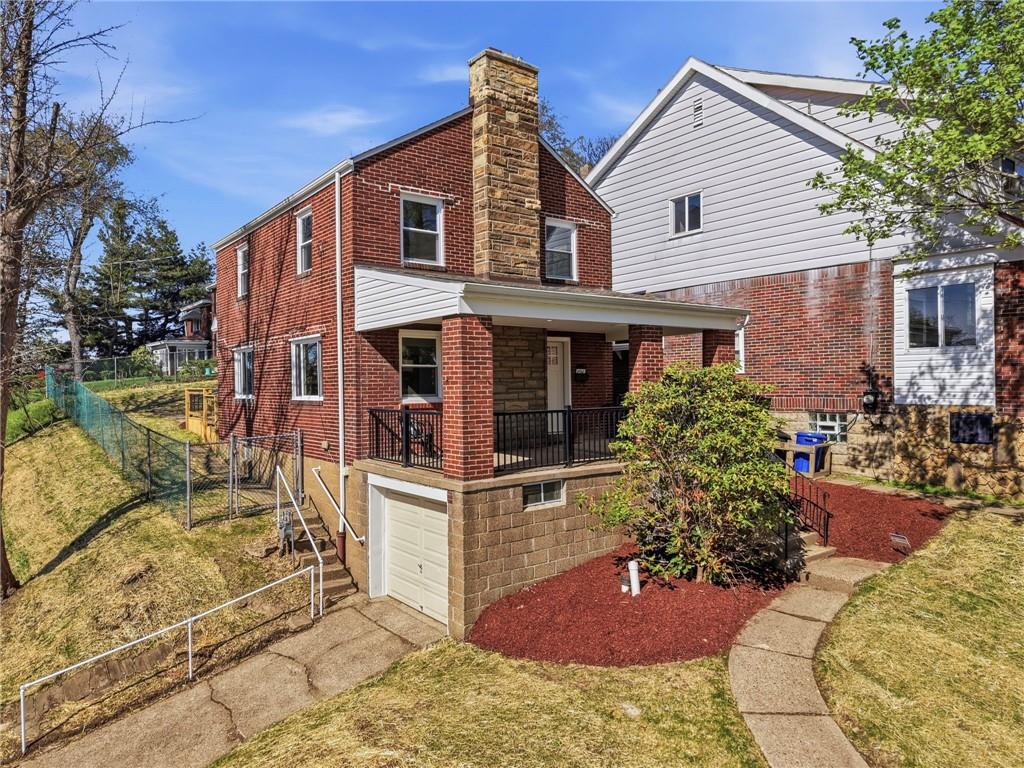 6501 Landview Road Pittsburgh, PA 15217 - Photo 36 of 41 a front view of a house with a yard