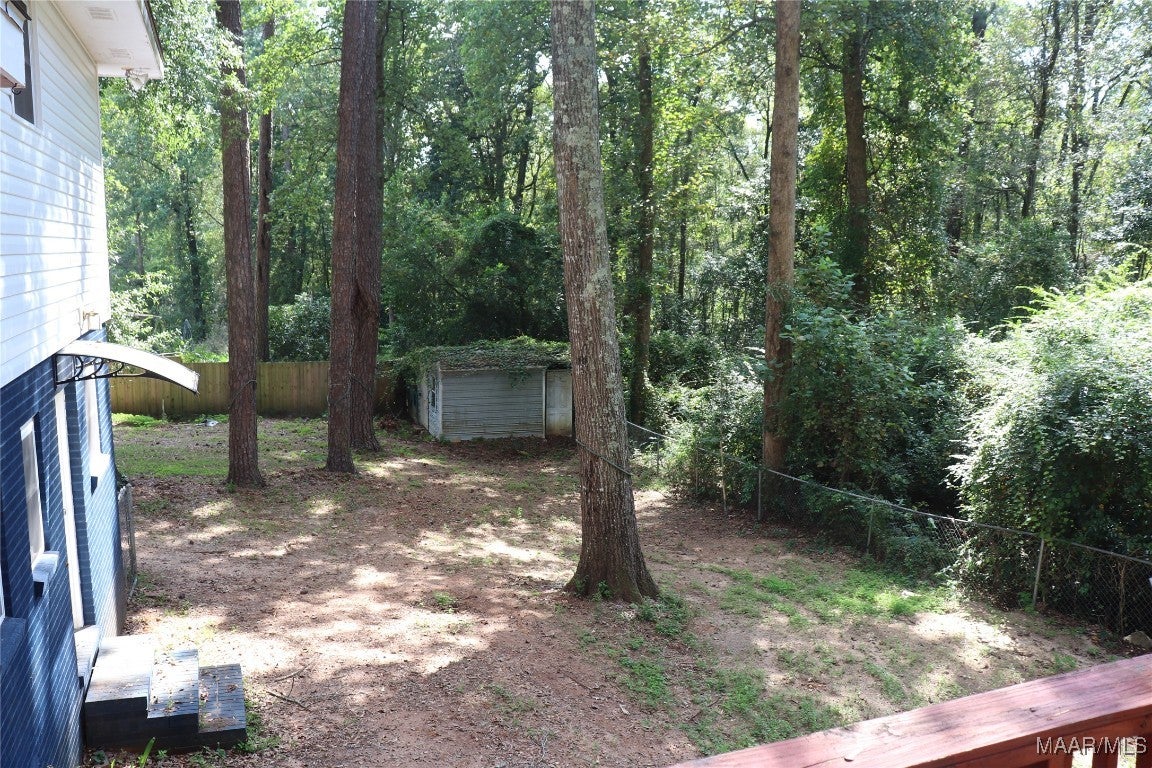 313 Holly Hill Road Enterprise, AL 36330 - Photo 39 of 44 Fenced backyard with storage shed.