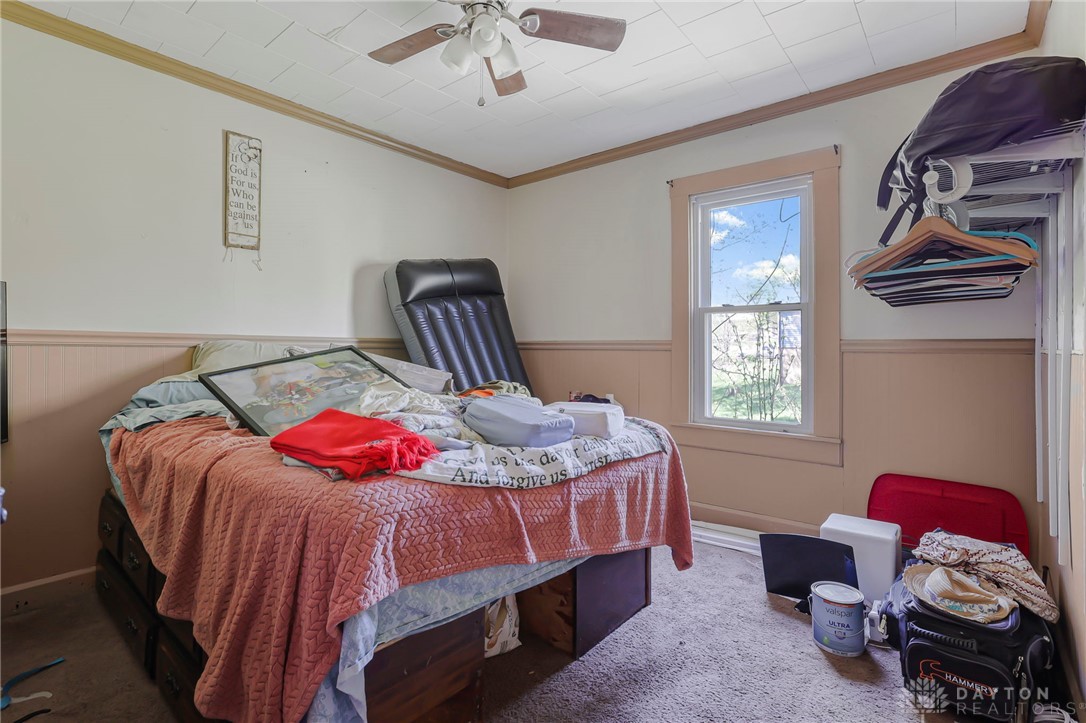 2390 Ridge Road Zanesville, OH 43701 - Photo 21 of 45 This cozy bedroom offers a tranquil retreat with ample natural light.