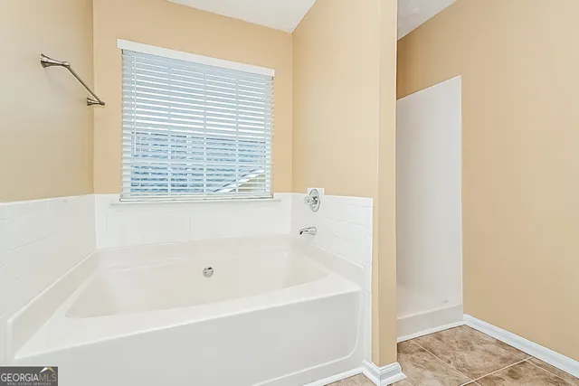 a bathroom with a bathtub