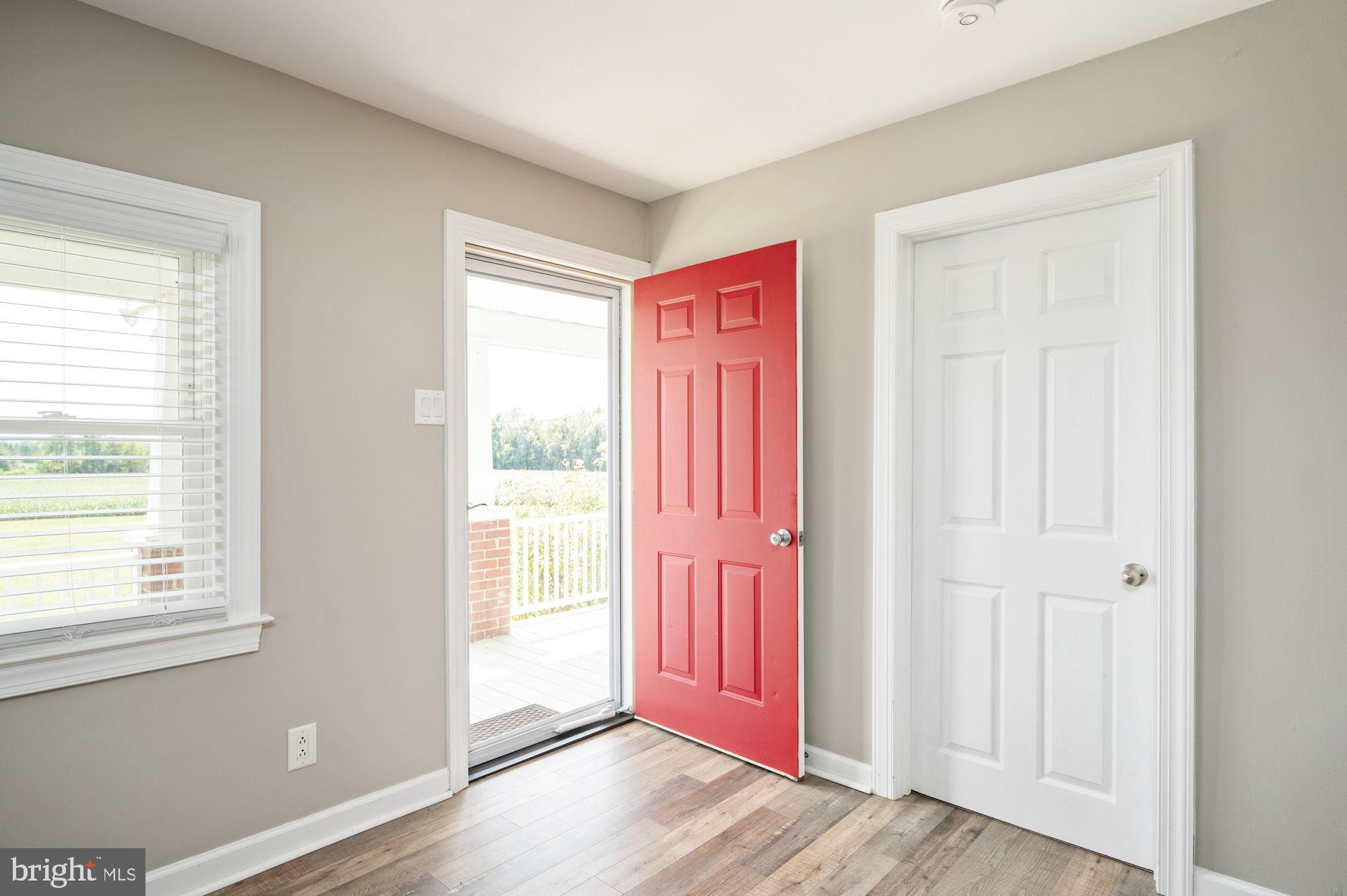 161 Forest Lane Road Fredericksburg, VA 22405 - Photo 16 of 99 a view of a room with wooden floor and windows