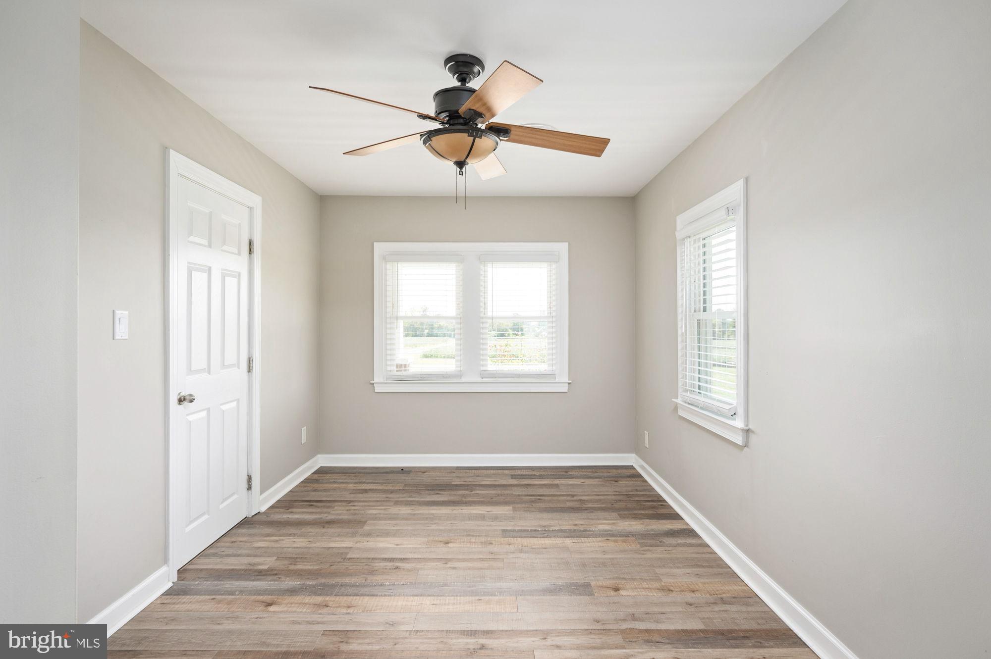 161 Forest Lane Road Fredericksburg, VA 22405 - Photo 31 of 99 a view of empty room with wooden floor and fan