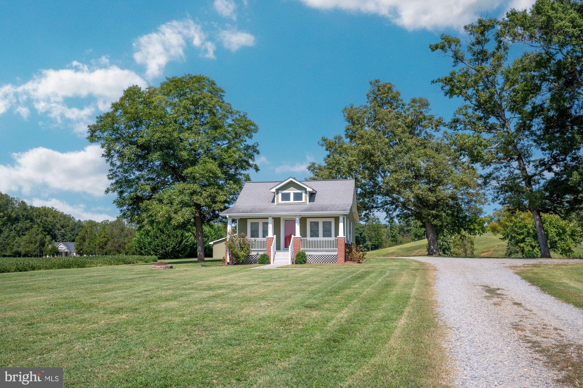 161 Forest Lane Road Fredericksburg, VA 22405 - Photo 94 of 99 a front view of a house with a yard