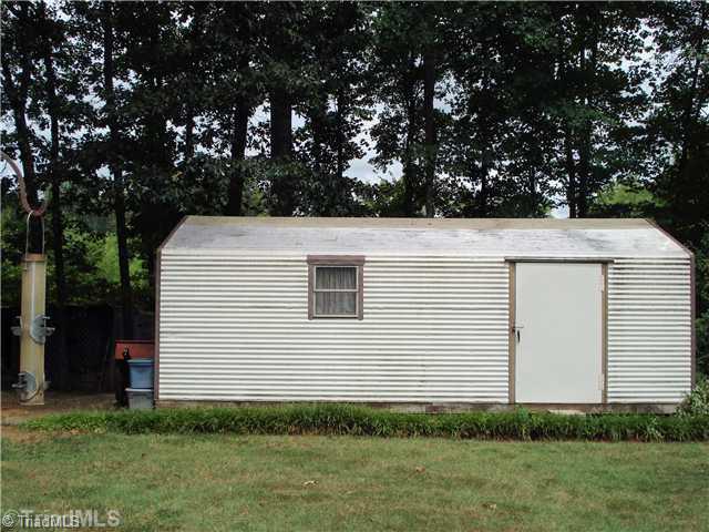 400 Grenham Road Greensboro, NC 27455 - Photo 11 of 15 Workshop. In the backyard, there is a wired Leonard Outbuilding that will be a dream "Man Cave". Building is 14x28!
