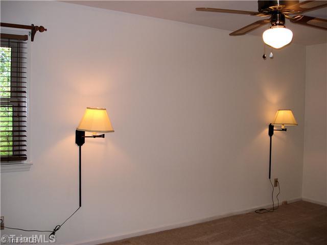 400 Grenham Road Greensboro, NC 27455 - Photo 10 of 15 Master Bedroom. The master has a generous walk in closet and a nice size master bathroom with shower.