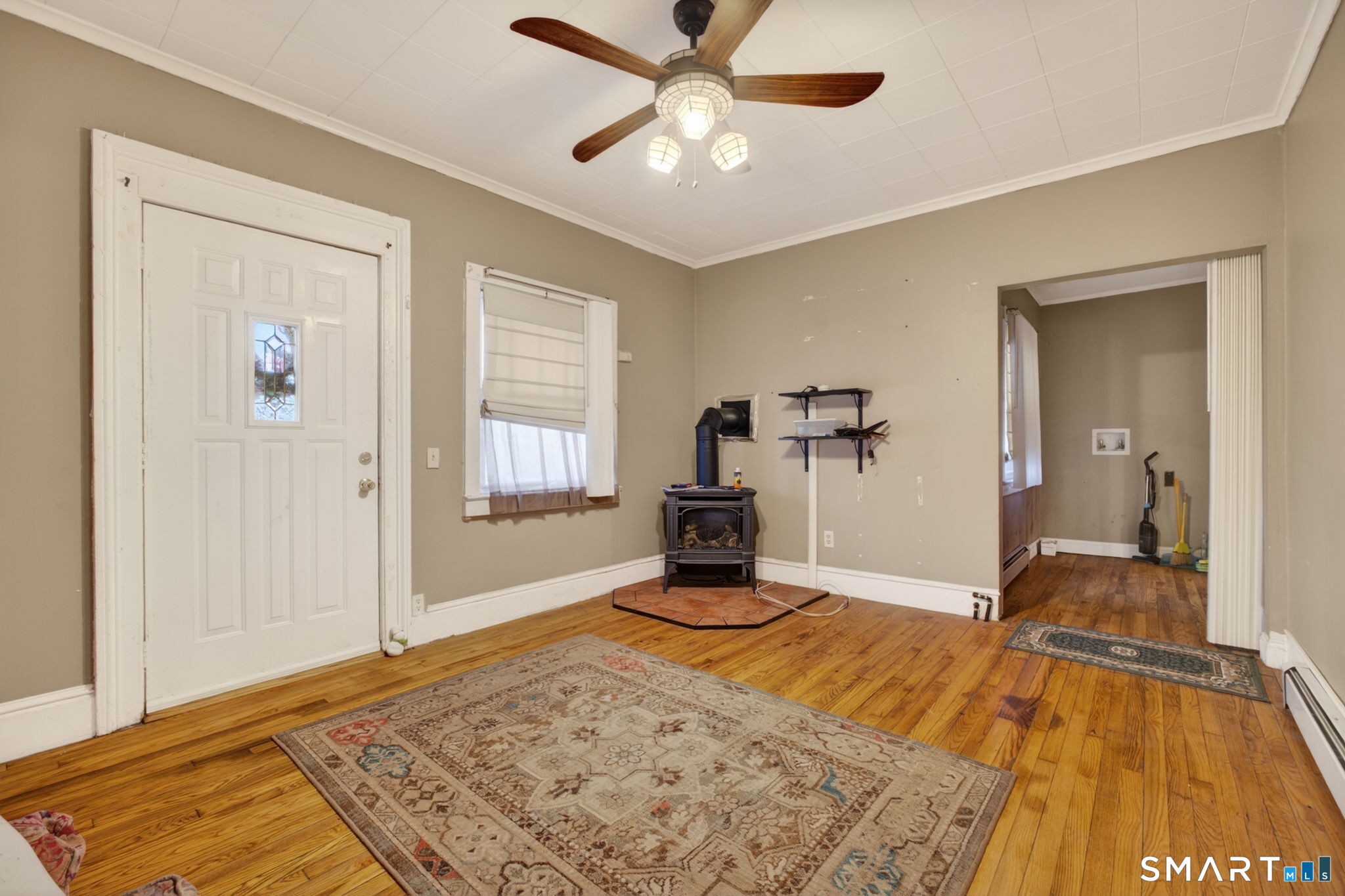 670 Hanover Road Meriden, CT 06451 - Photo 26 of 40 a bedroom with a bed and a chandelier