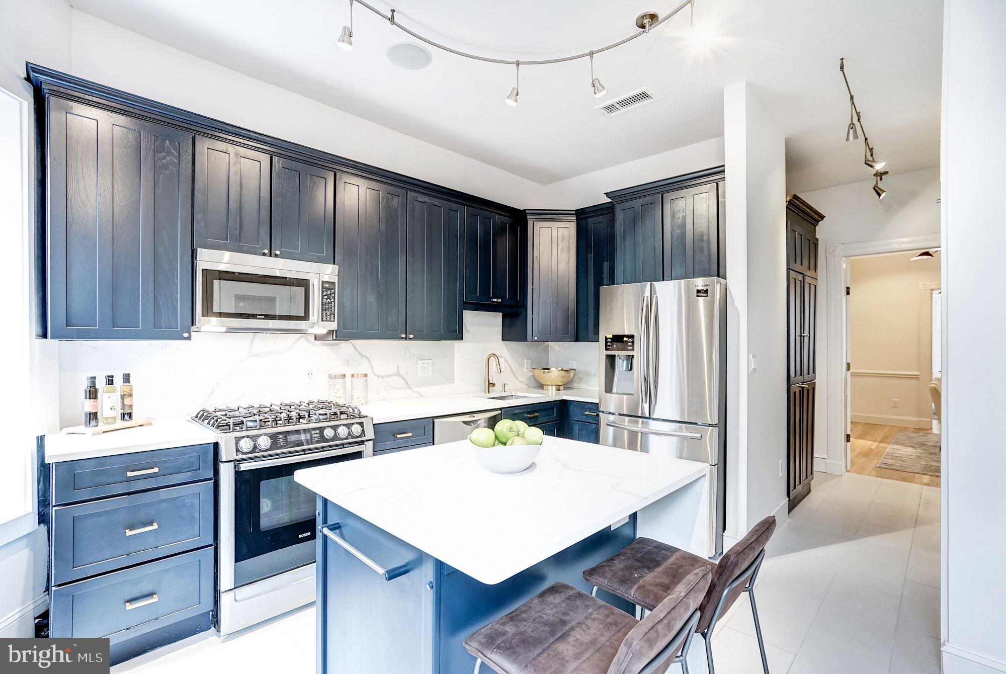 1332 Riggs Street Northwest Washington, DC 20009 - Photo 13 of 36 Quartz counters & spectacular cabinetry