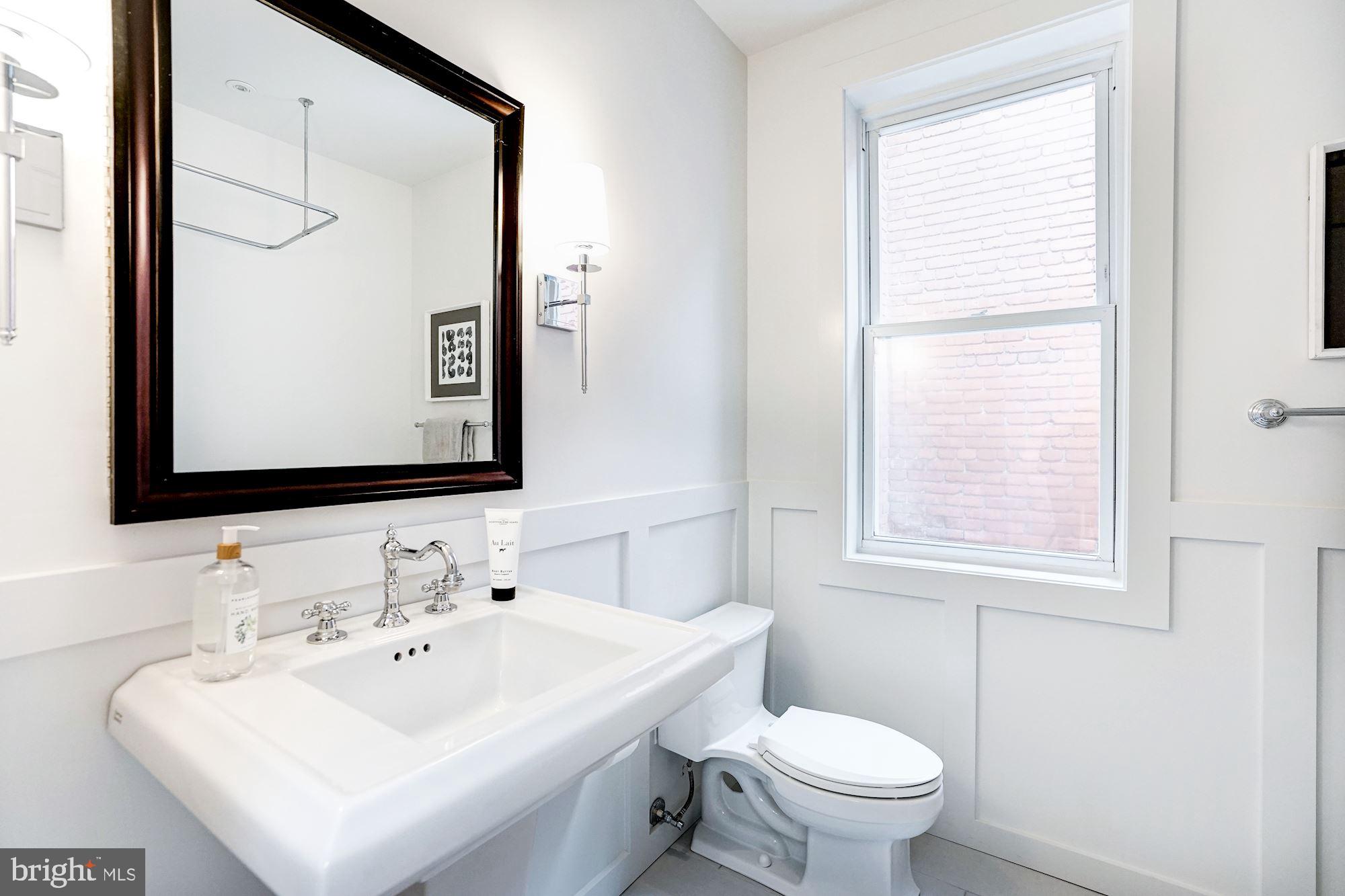 1332 Riggs Street Northwest Washington, DC 20009 - Photo 17 of 36 Hall Bath w/ handsome millwork