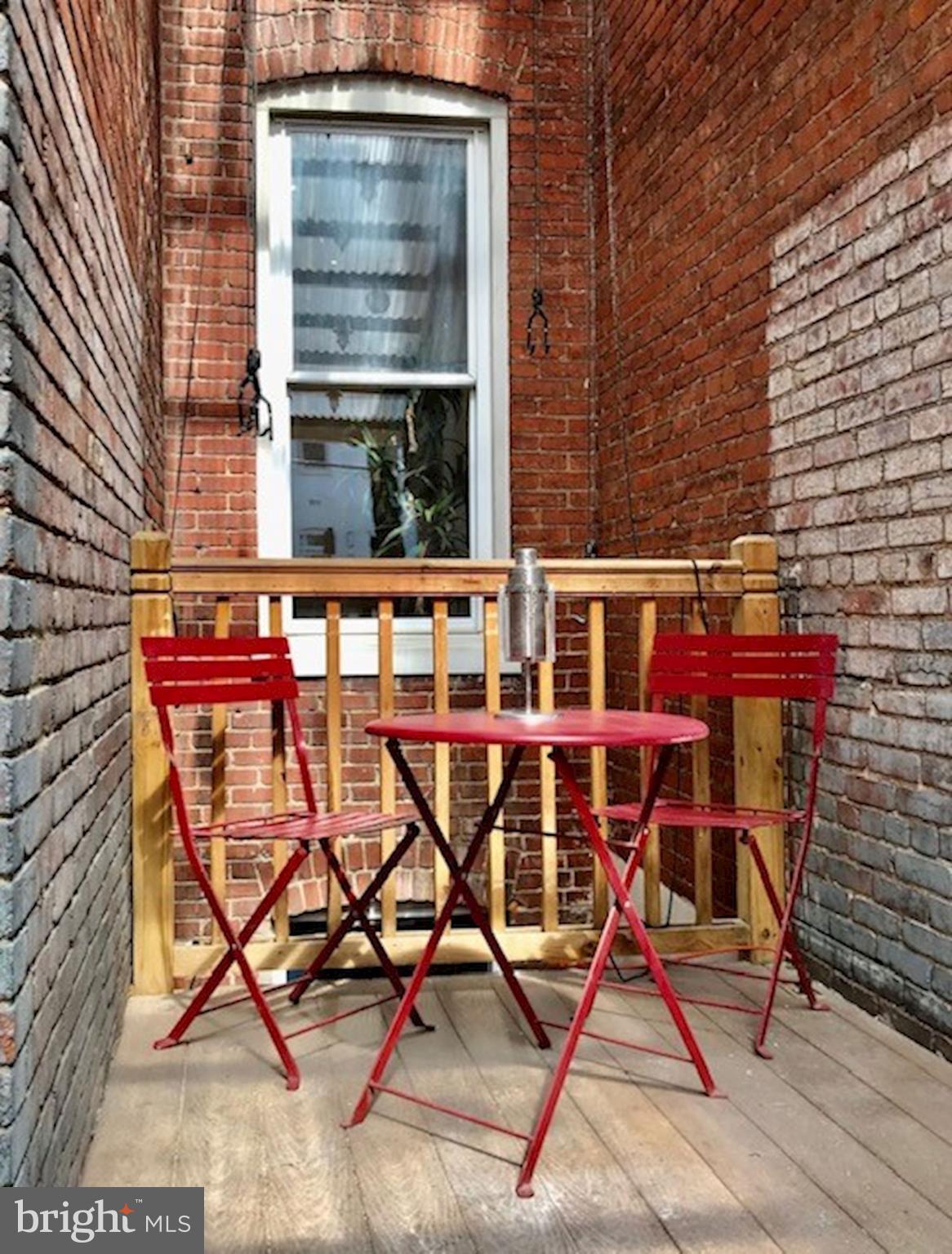 1332 Riggs Street Northwest Washington, DC 20009 - Photo 23 of 36 Cozy rear deck for coffee or wine! with access to