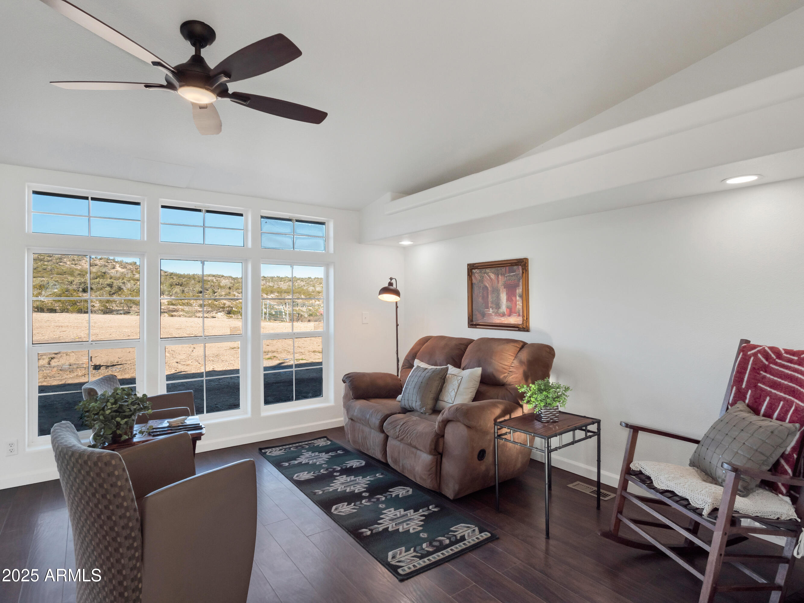 2164 East Liberty Trail Rimrock, AZ 86335 - Photo 12 of 36 a living room with furniture and a large window