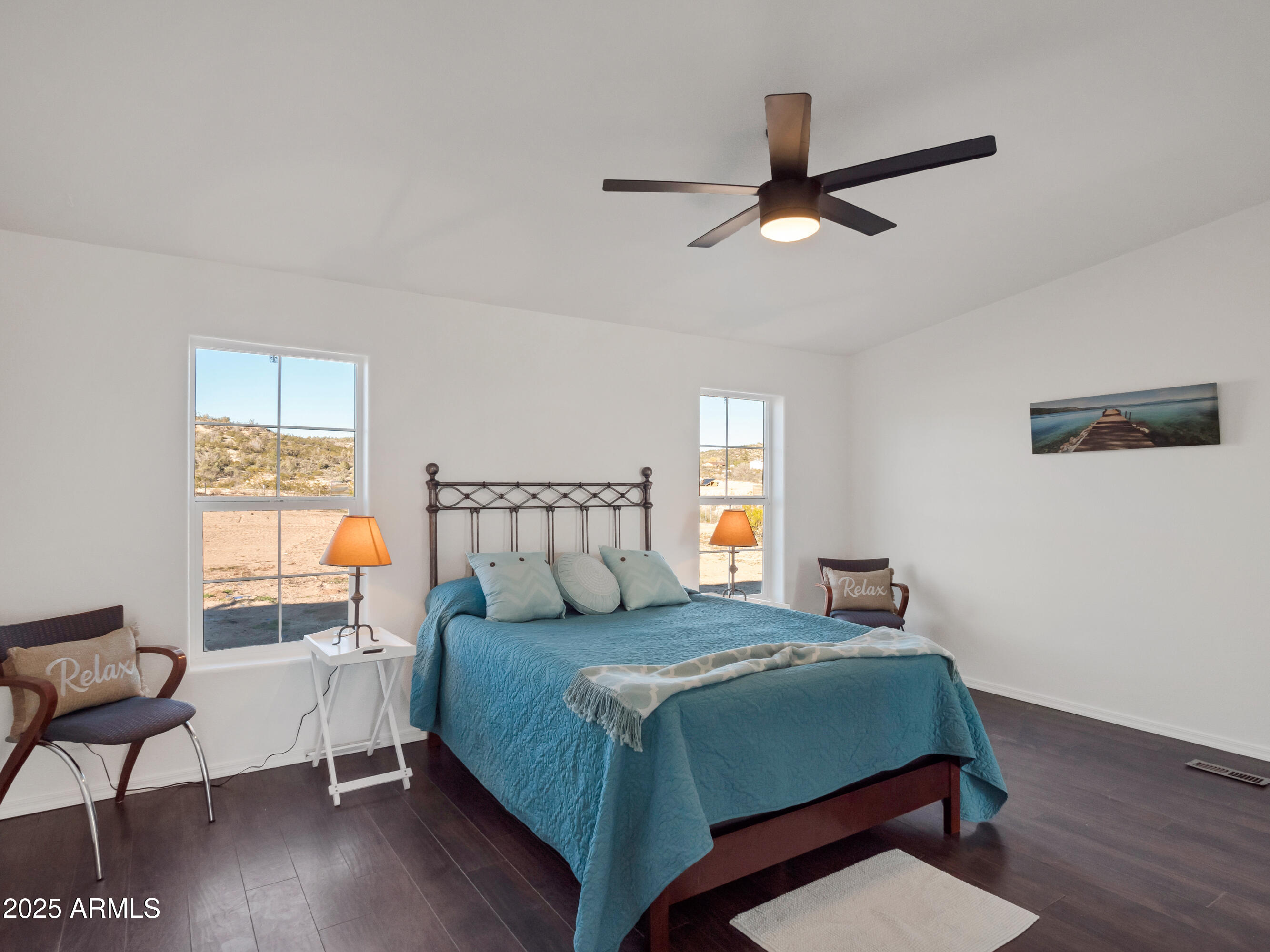 2164 East Liberty Trail Rimrock, AZ 86335 - Photo 15 of 36 a bedroom with a bed and window