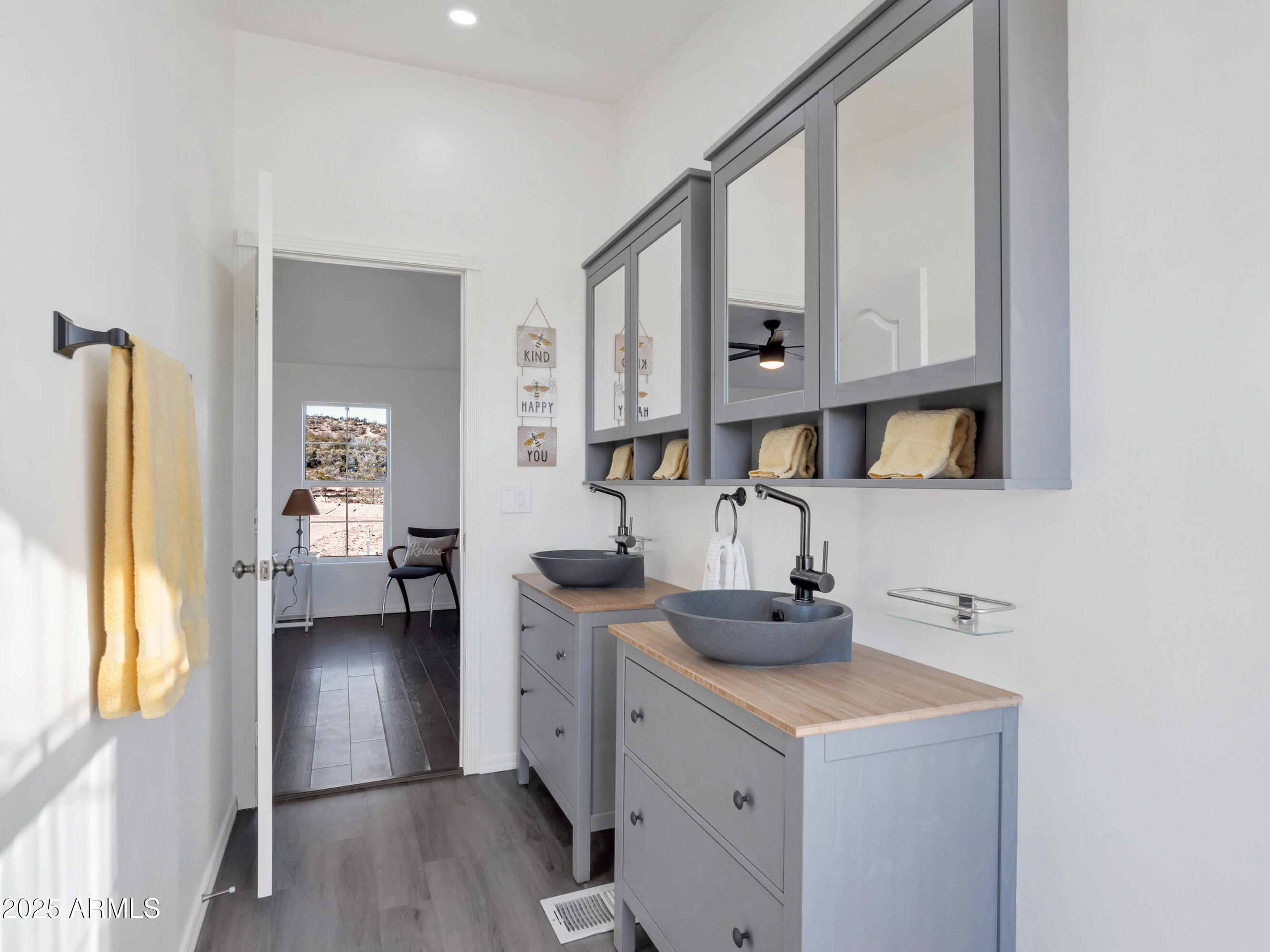 2164 East Liberty Trail Rimrock, AZ 86335 - Photo 18 of 36 a kitchen with stainless steel appliances a sink stove and wooden floor
