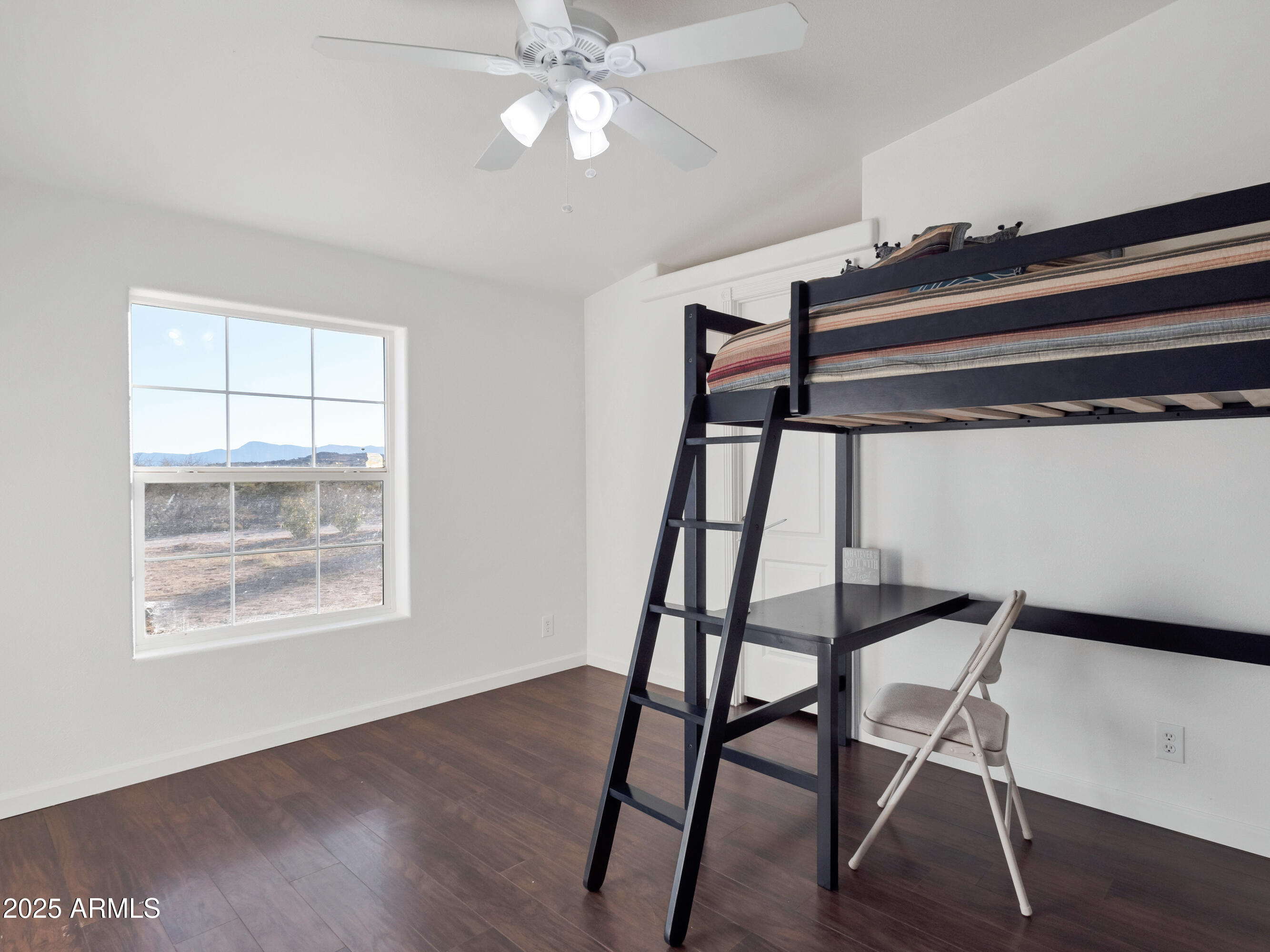 2164 East Liberty Trail Rimrock, AZ 86335 - Photo 25 of 36 a view of a workspace with furniture and wooden floor