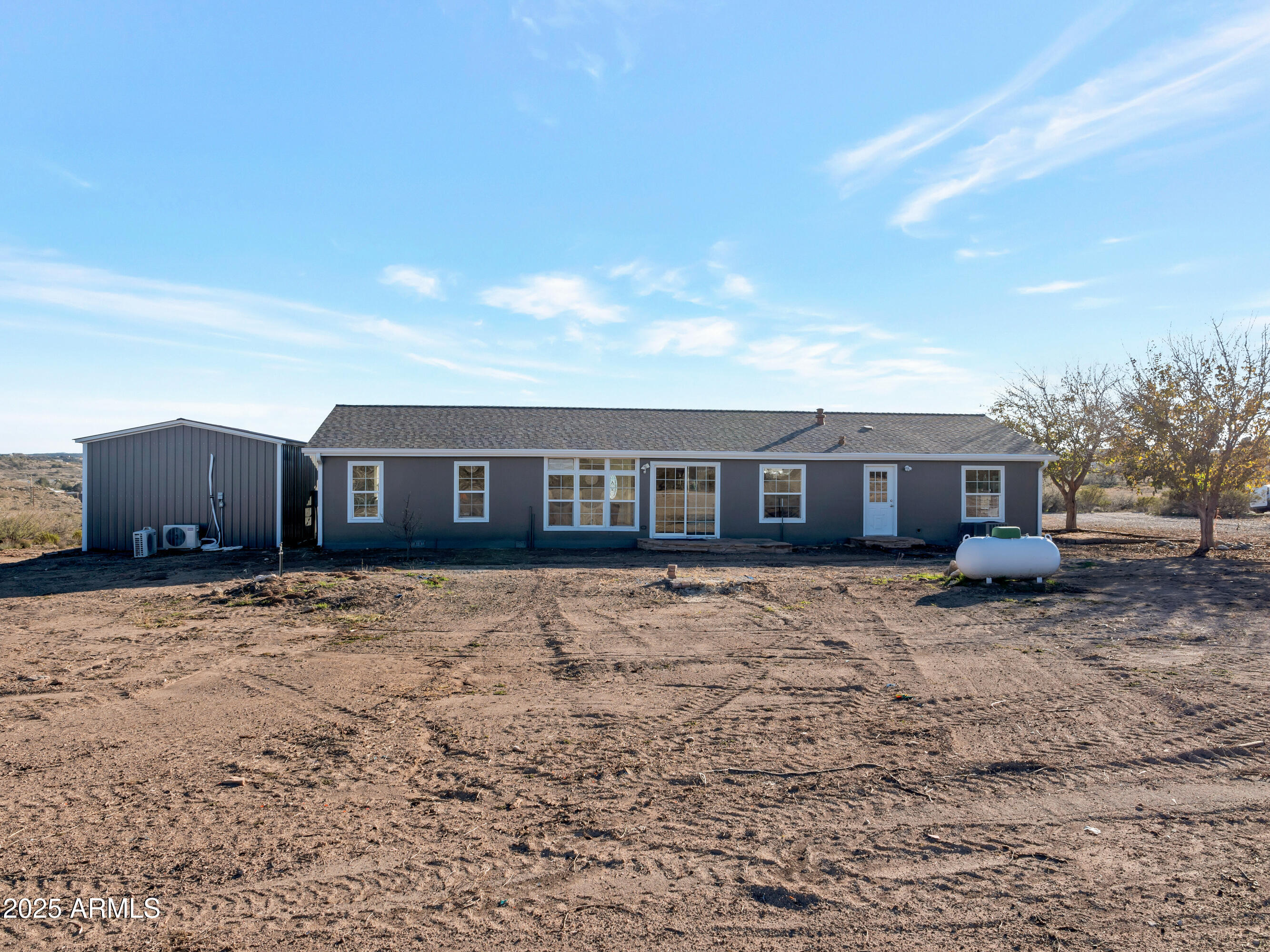 2164 East Liberty Trail Rimrock, AZ 86335 - Photo 35 of 36 a view of a house with a yard