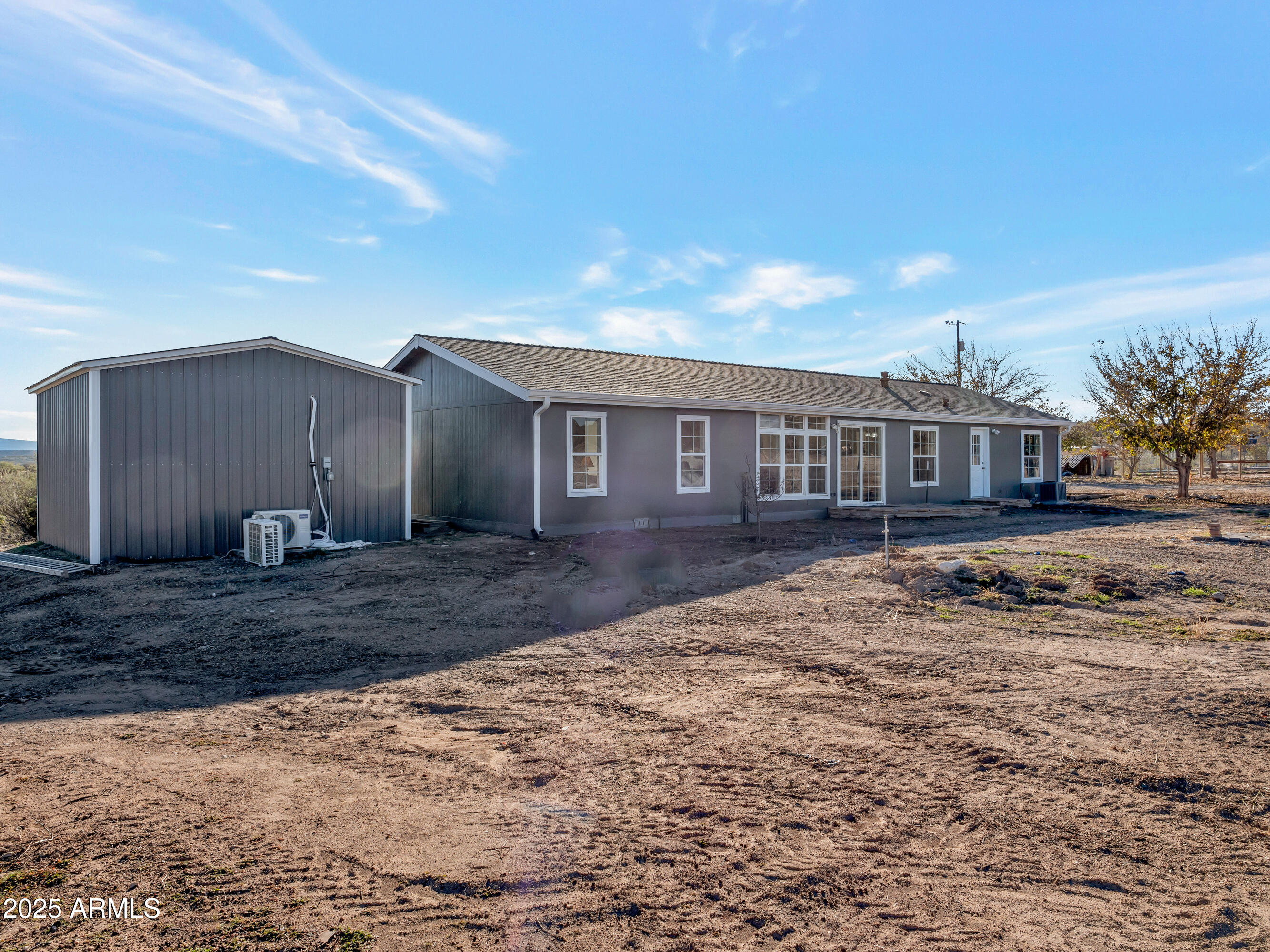 2164 East Liberty Trail Rimrock, AZ 86335 - Photo 36 of 36 a view of a house with a yard