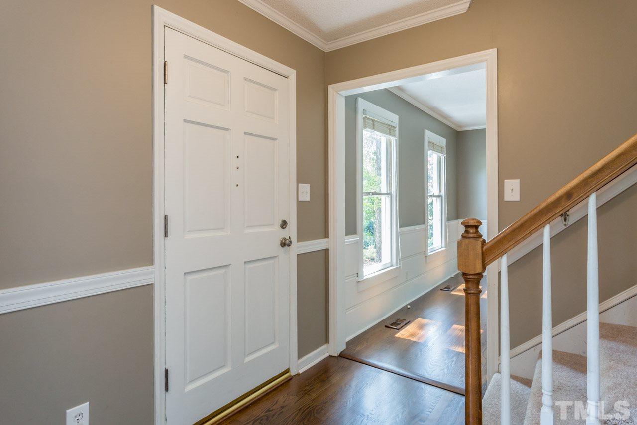7308 Wilderness Road Raleigh, NC 27613 - Photo 2 of 25 a view of front door