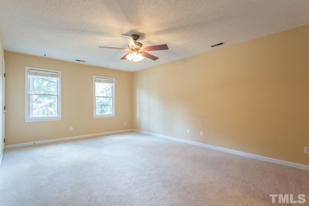 7308 Wilderness Road Raleigh, NC 27613 - Photo 16 of 25 a view of empty room with window