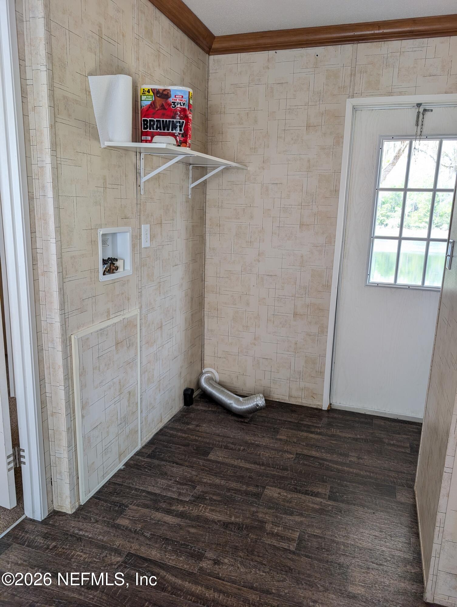 125 Hayman Drive Interlachen, FL 32148 - Photo 11 of 14 a view of a hallway with wooden floor and closet