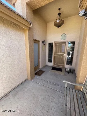 a view of a livingroom with furniture and garage