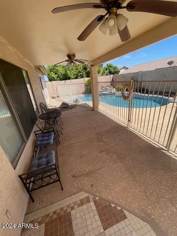 a view of a backyard with an outdoor space