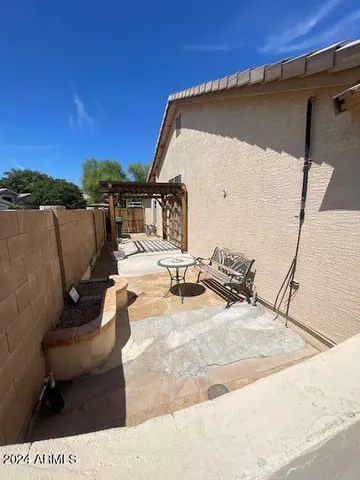 a kitchen with stainless steel appliances kitchen island granite countertop a sink and a stove