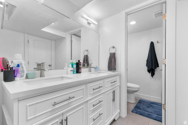1489 North 400 West Bountiful, UT 84010 - Photo 30 of 47 Dual vanity with white cabinetry and integrated sinks