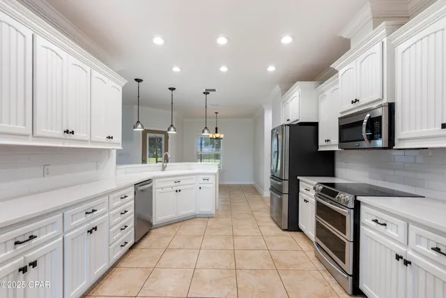 $595,000 | 7712 South McCann Road, Southport, FL 32409