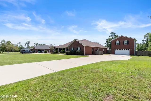 $595,000 | 7712 South McCann Road, Southport, FL 32409