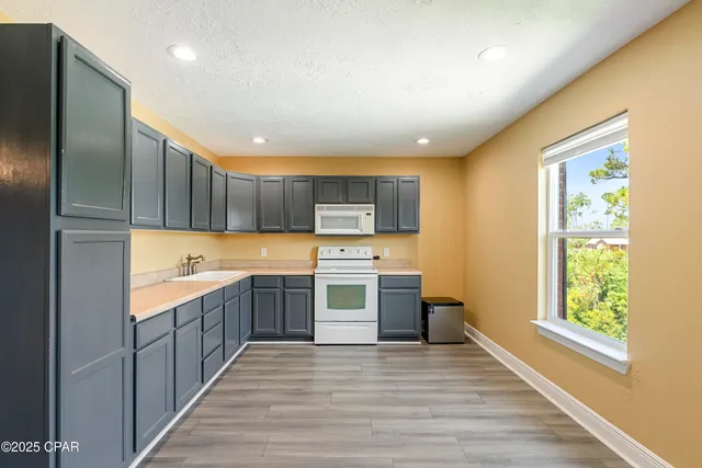 $595,000 | 7712 South McCann Road, Southport, FL 32409