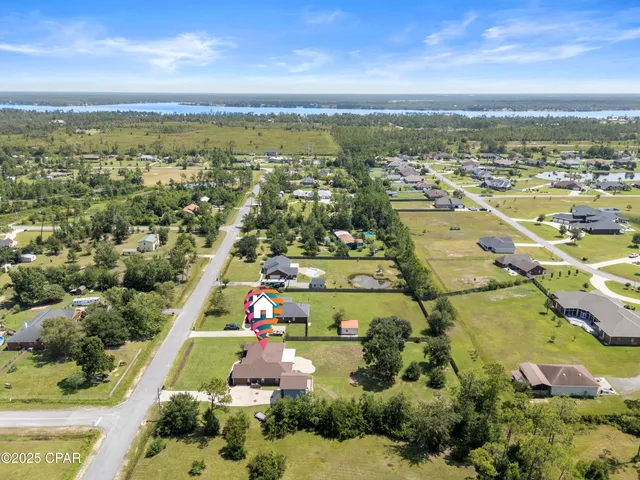 $595,000 | 7712 South McCann Road, Southport, FL 32409