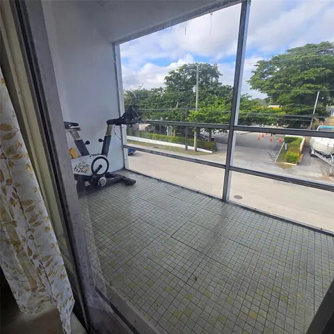 a view of a floor to ceiling window with a sink