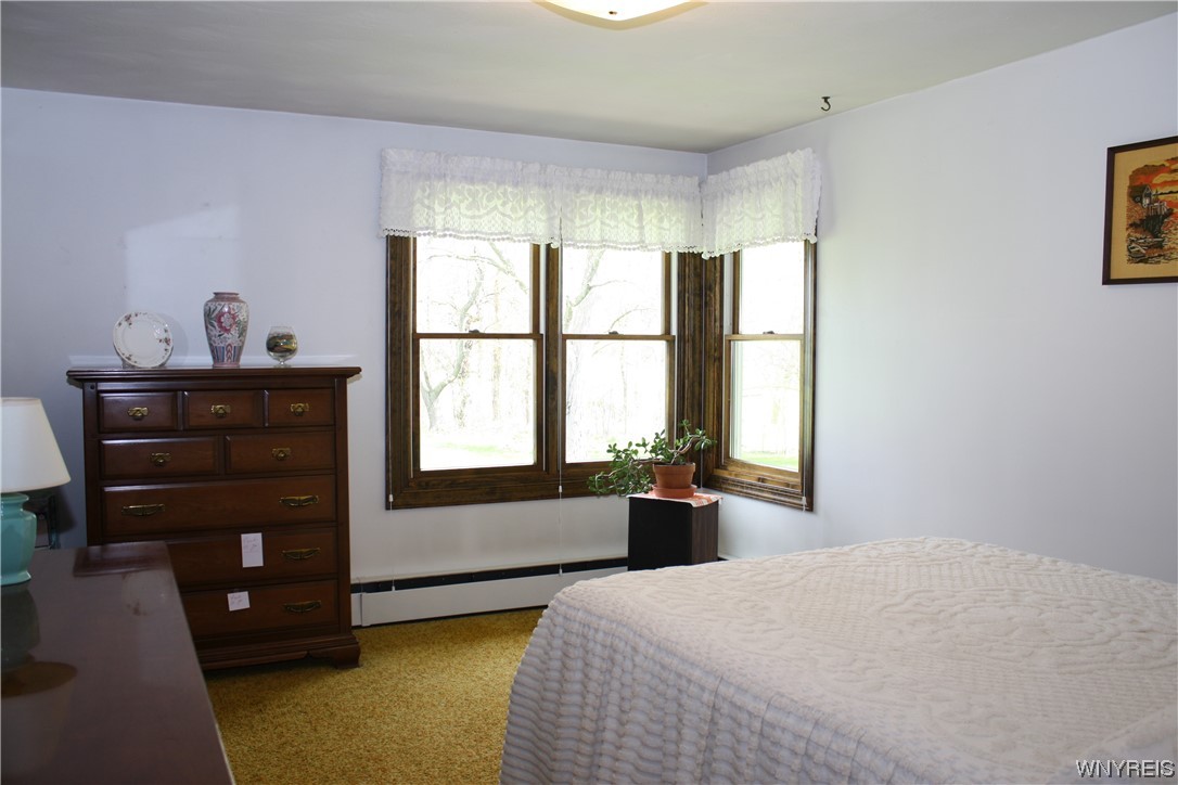 2831 Lower Mountain Road Lewiston, NY 14131 - Photo 25 of 44 Bedroom 4 with views of backyard and escarpment